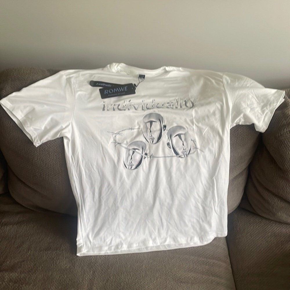 XS oversized men’s shirt. Fits more like a medium in women